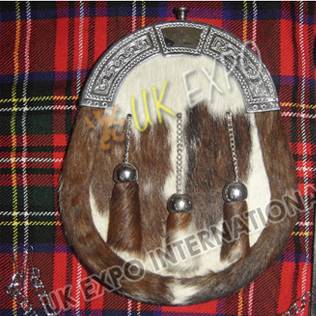 Brown and white cow hide skin with sinple celtic cantle