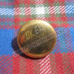 Plain brass button